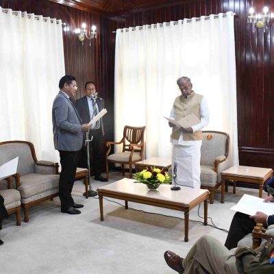 Governor of Nagaland La. Ganesan administering the oath for Pro-tem Speaker, Mhathung Yanthan in the presence of Chief Secretary, DGP Nagaland, Home Commissioner and other officials at Raj Bhavan on 10th March 2023