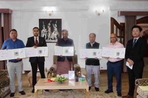 Governor of Nagaland La Ganesan with Secretary to Governor Rajesh Soundararajan, Jt. Secy. and Postal officials during the releasing of Postal Cover on Naga Back Basket at Raj Bhavan on 13 July 2023
