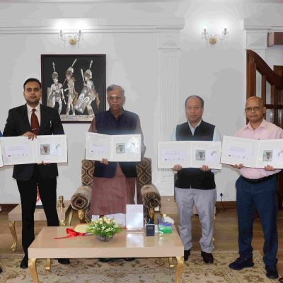 Governor of Nagaland La Ganesan with Secretary to Governor Rajesh Soundararajan, Jt. Secy. and Postal officials during the releasing of Postal Cover on Naga Back Basket at Raj Bhavan on 13 July 2023