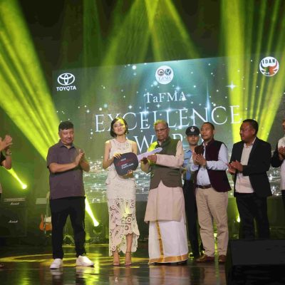 Governor handed over the Achiever of the Year Award 2023 to Andrea Kevichusa at RCEMBA, Jotsma on 4th September 2023